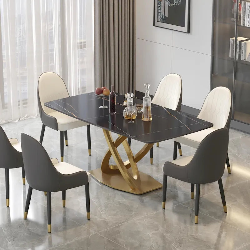 Table de salle à manger avec plateau rectangulaire en pierre frittée et piètement doré