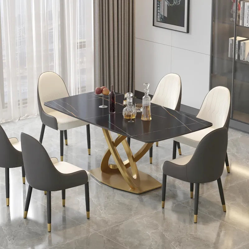Table de salle à manger avec plateau rectangulaire en pierre frittée et piètement doré