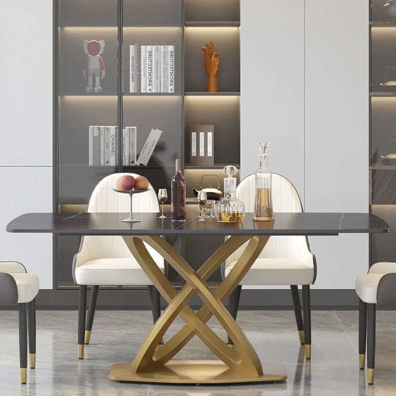Table de salle à manger avec plateau rectangulaire en pierre frittée et piètement doré