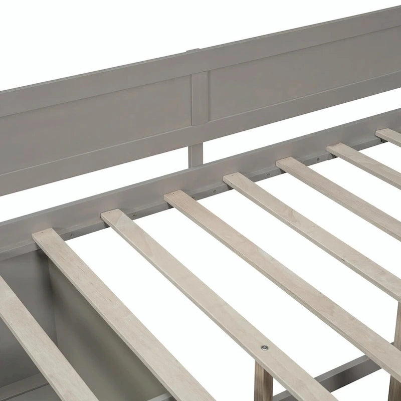 Lit de repos avec tiroirs de rangement et étagères